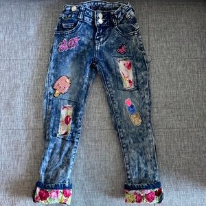 Vintage acid wash jeans with patches